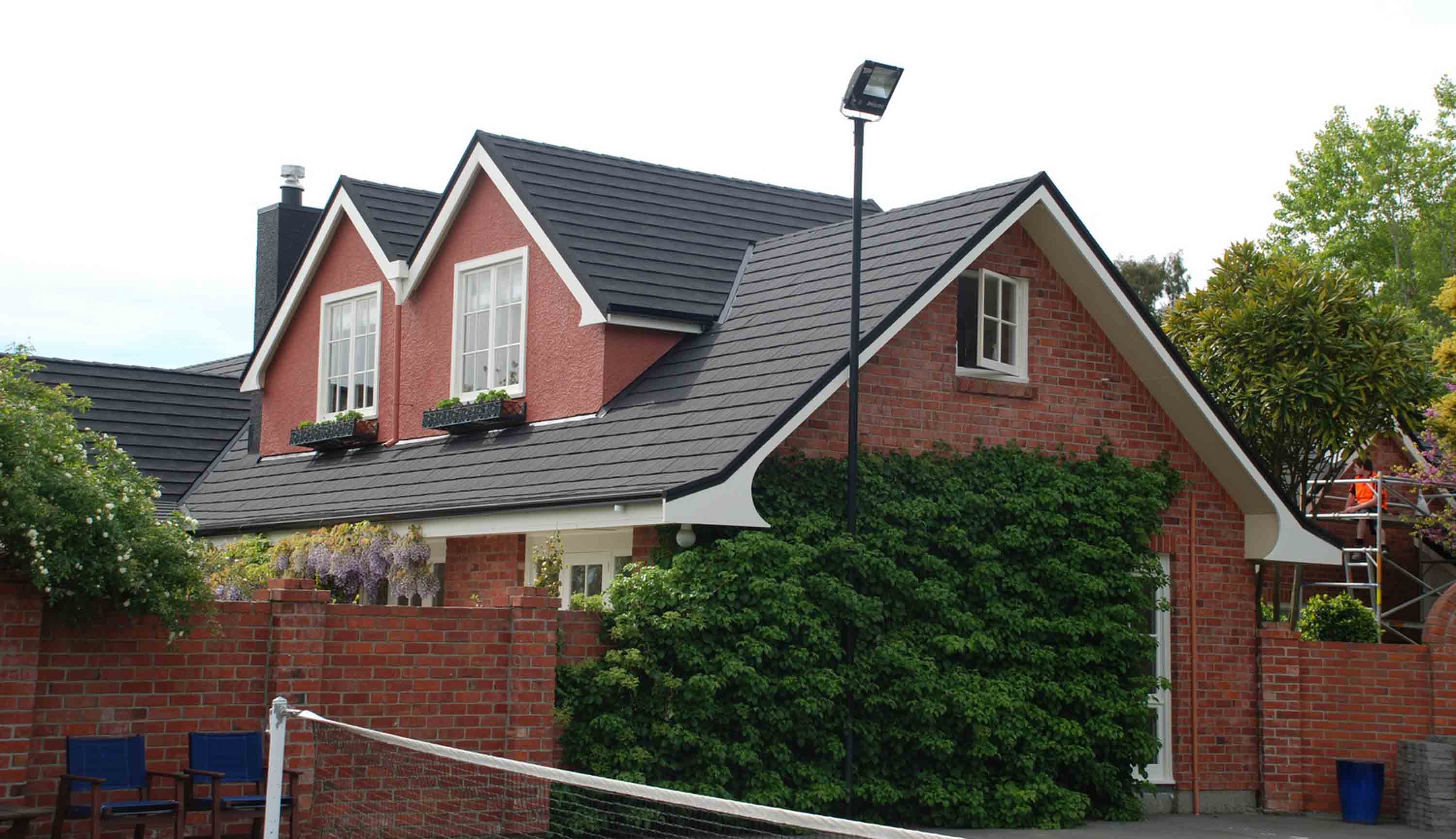 Home re-roofed in CF Slate lightweight metal roofing after being damaged from earthquake